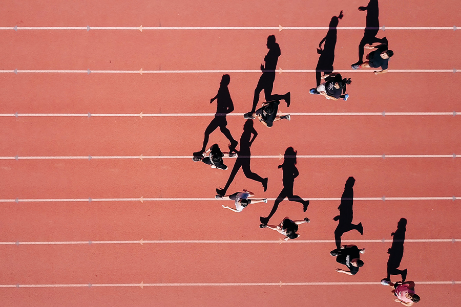 runners racing on track