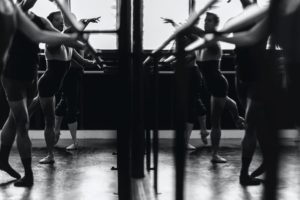 ballet dancers practicing black and white