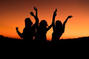 dancing silhouettes at sunset 