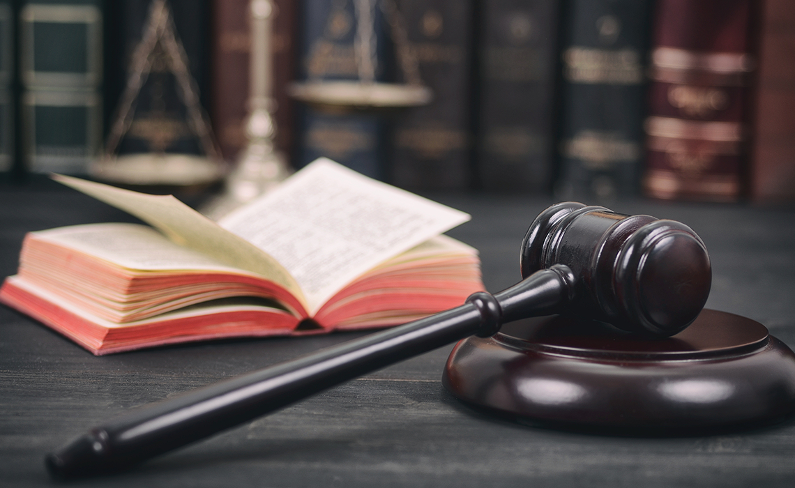 gavel and open legal book