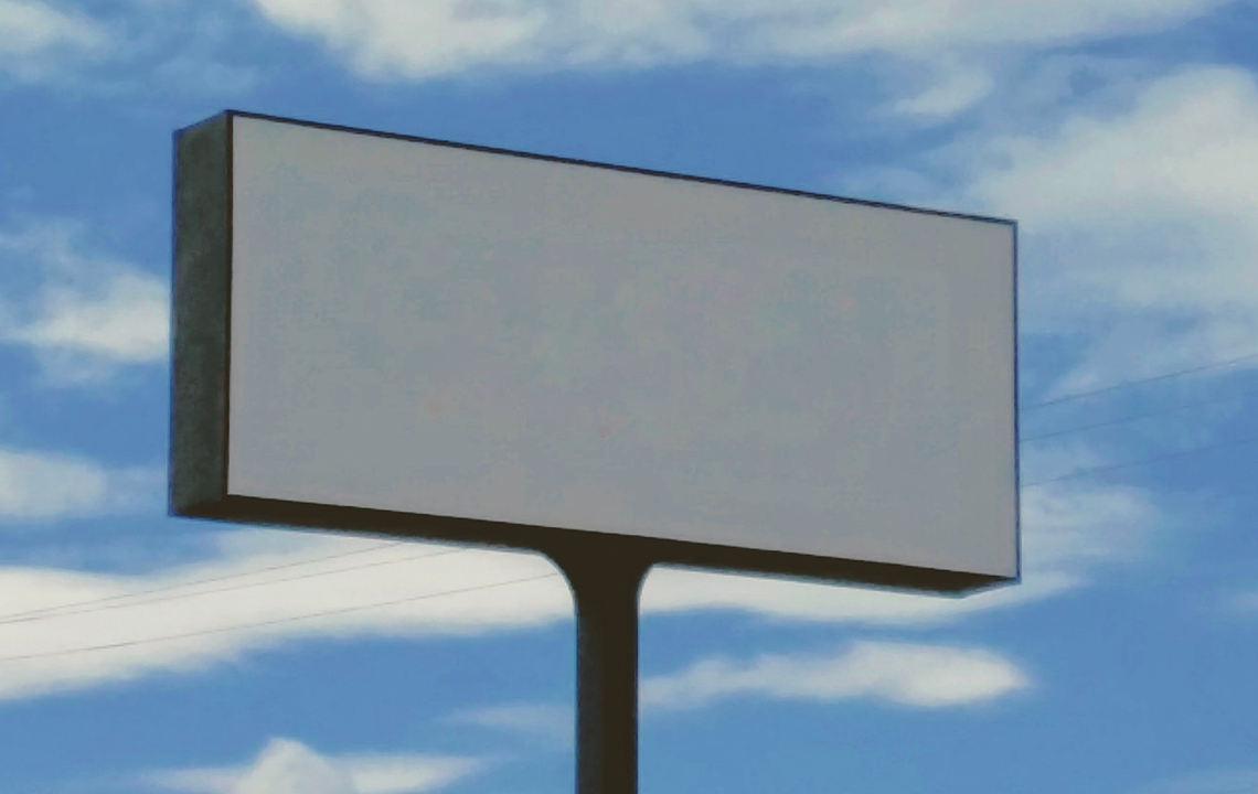 blank billboard in front of clouds