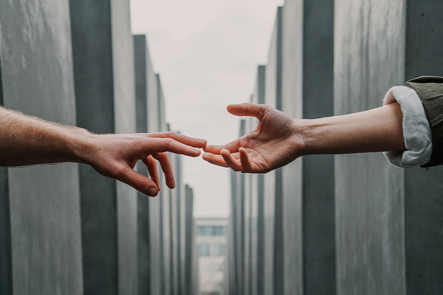 hands reaching out
