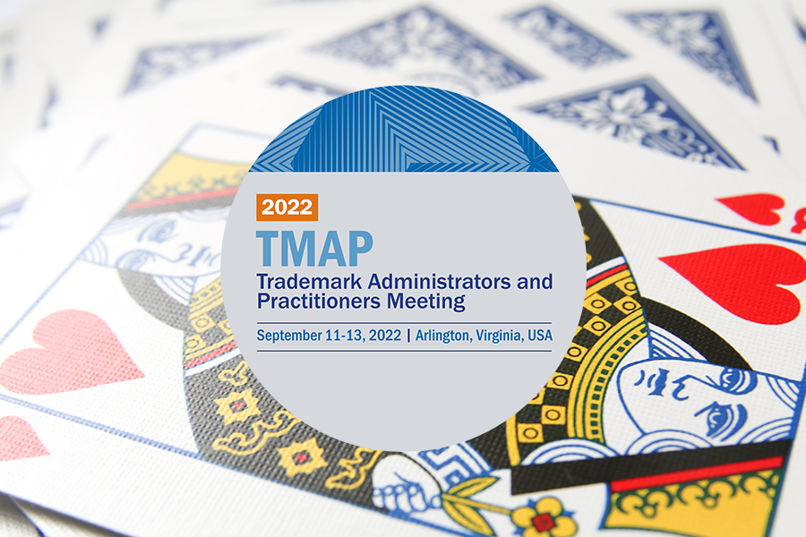 2022 TMAP over playing card background