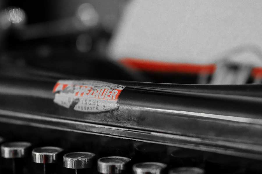 close up picture of typewriter logo