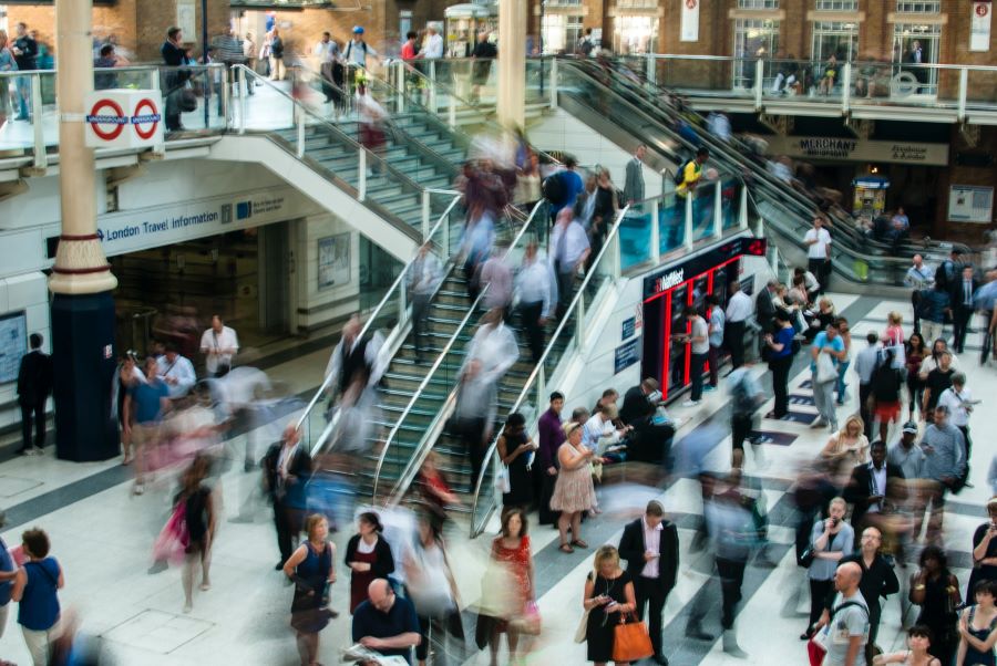 blurred purspective of a busy mall with shoppers